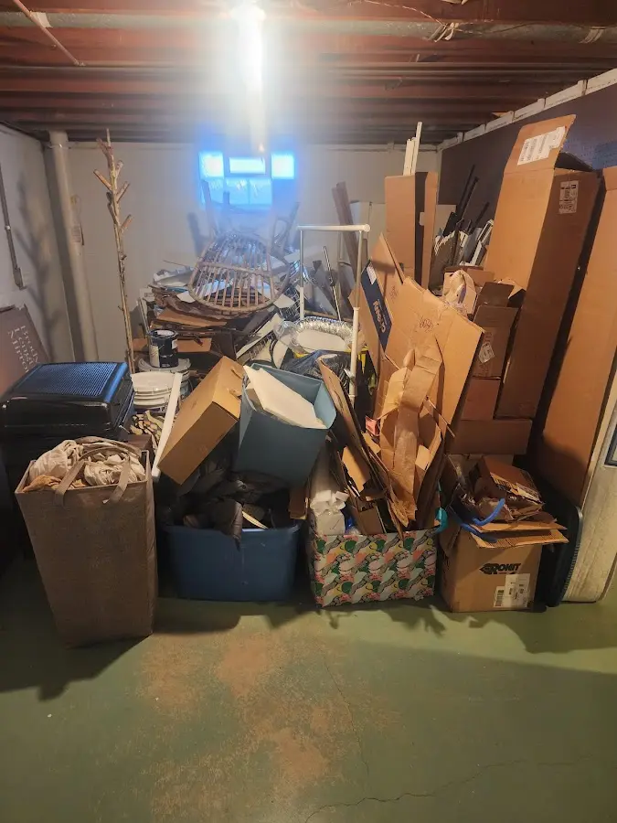 Roll-off dumpster container at job site for Construction Dumpster Rental in Tiverton